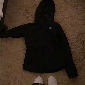 Black jacket with warm insulated inside.